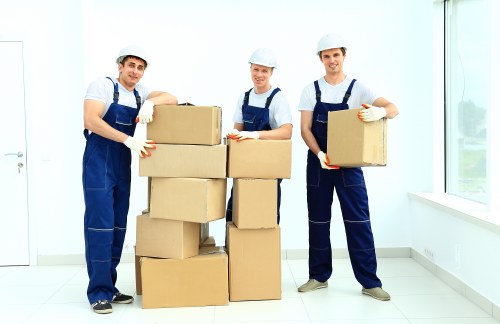 Unpacking boxes into a new Ruislip home with organised room placement
