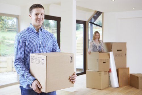 Trained movers using safety procedures on a relocation job