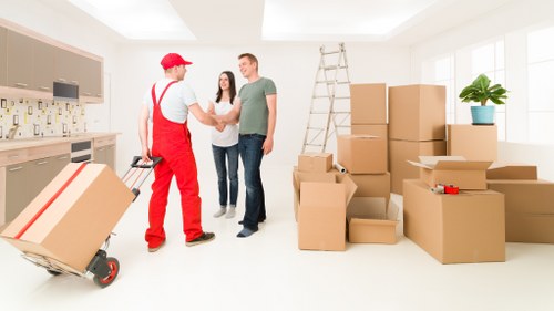 Local furniture removal team handling large household items in Ruislip